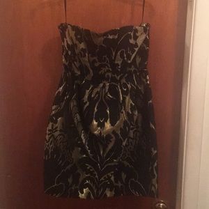 Strapless black and metallic gold dress